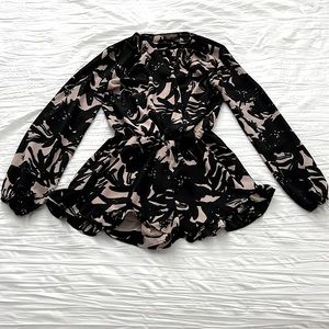 Long sleeve black and light pink floral print romper Size S